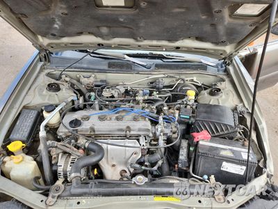 Zdjęcie 11 z 14 samochodu: 1999 NISSAN ALTIMA XE VIN:1N4DL01D9XC164422 - miniatura