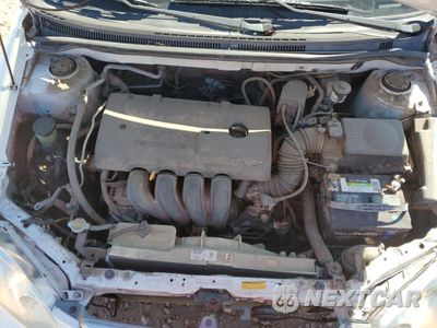Zdjęcie 11 z 12 samochodu: 2004 TOYOTA COROLLA CE VIN:1NXBR32E84Z248807 - miniatura