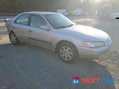Czwarte zdjęcie samochodu z boku: 1997 TOYOTA CAMRY CE VIN:4T1BF22KXVU900658 - miniatura