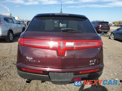 Zdjęcie 6 z 12 samochodu: 2011 LINCOLN MKT VIN:2LMHJ5AT5BBJ51164 - miniatura