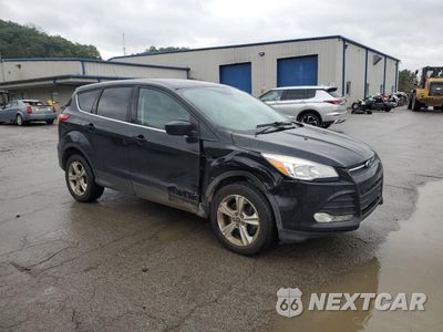 Czwarte zdjęcie samochodu z boku: 2016 FORD ESCAPE SE VIN:1FMCU9GX4GUB50443 - miniatura