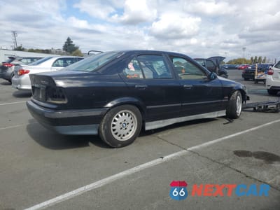 Trzecie zdjęcie samochodu z tyłu: 1994 BMW 325 I VIN:WBACB3325RFE19235 - miniatura