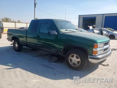 Czwarte zdjęcie samochodu z boku: 1999 CHEVROLET GMT-400 C1500 VIN:1GCEC19R6XR128964 - miniatura