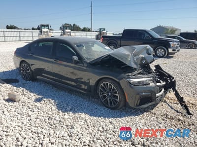 Czwarte zdjęcie samochodu z boku: 2022 BMW 740 I VIN:WBA7T2C03NCJ43914 - miniatura