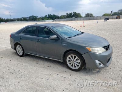 Czwarte zdjęcie samochodu z boku: 2012 TOYOTA CAMRY HYBRID VIN:4T1BD1FK1CU031911 - miniatura