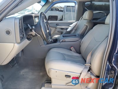 Zdjęcie 7 z 14 samochodu: 2003 GMC YUKON XL C1500 VIN:1GKEC16T43J113540 - miniatura
