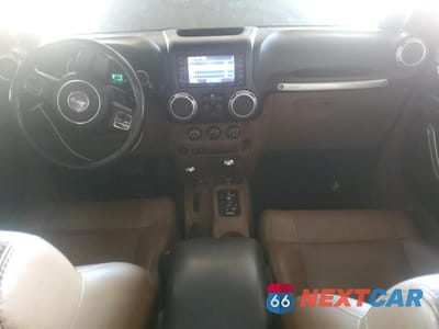 Zdjęcie 8 z 12 samochodu: 2012 JEEP WRANGLER UNLIMITED RUBICON VIN:1C4BJWFG4CL103454 - miniatura