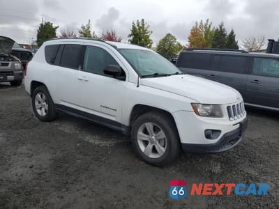 Czwarte zdjęcie samochodu z boku: 2016 JEEP COMPASS SPORT VIN:1C4NJDBB9GD662302 - miniatura