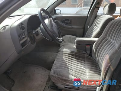 Zdjęcie 7 z 12 samochodu: 2001 CHEVROLET LUMINA VIN:2G1WL52J411298104 - miniatura