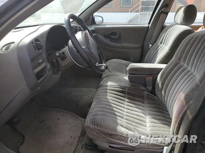Zdjęcie 7 z 12 samochodu: 2001 CHEVROLET LUMINA VIN:2G1WL52J411298104 - miniatura
