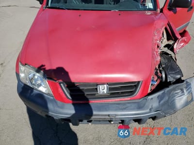 Zdjęcie 12 z 13 samochodu: 1999 HONDA CR-V LX VIN:JHLRD1846XC041933 - miniatura