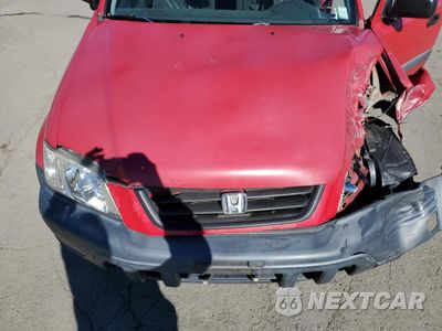 Zdjęcie 12 z 13 samochodu: 1999 HONDA CR-V LX VIN:JHLRD1846XC041933 - miniatura