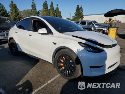 Czwarte zdjęcie samochodu z boku: 2021 TESLA MODEL Y VIN:5YJYGDEE1MF090728 - miniatura