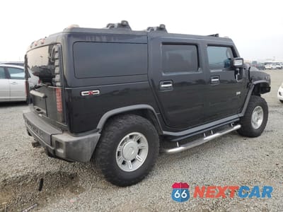 Trzecie zdjęcie samochodu z tyłu: 2003 HUMMER H2 VIN:5GRGN23U03H137888 - miniatura