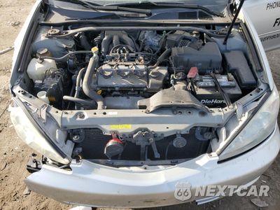 Zdjęcie 11 z 14 samochodu: 2004 TOYOTA CAMRY LE VIN:4T1BF30K84U579971 - miniatura
