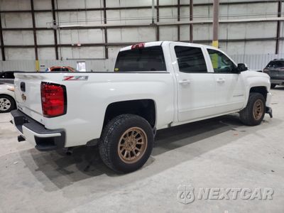 Trzecie zdjęcie samochodu z tyłu: 2017 CHEVROLET SILVERADO K1500 LT VIN:3GCUKREC7HG273141 - miniatura