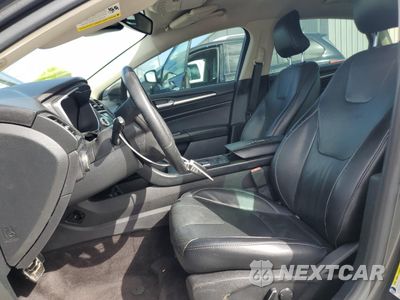 Zdjęcie 7 z 12 samochodu: 2017 FORD FUSION TITANIUM HEV VIN:3FA6P0RU6HR236665 - miniatura