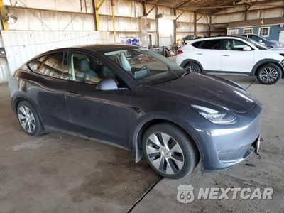 Czwarte zdjęcie samochodu z boku: 2023 TESLA MODEL Y VIN:7SAYGDEE4PA151171 - miniatura
