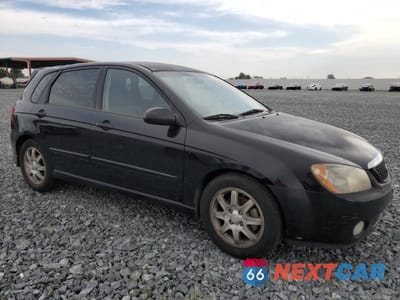 Czwarte zdjęcie samochodu z boku: 2006 KIA SPECTRA5 VIN:KNAFE162265233378 - miniatura