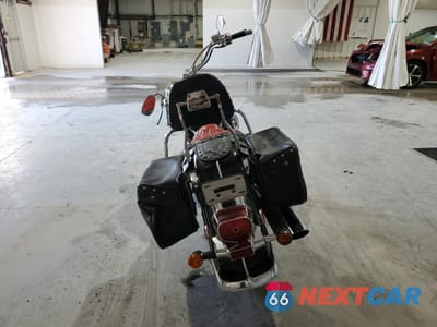 Czwarte zdjęcie samochodu z boku: 2005 SUZUKI C50 VIN:JS1VS55A052108106 - miniatura