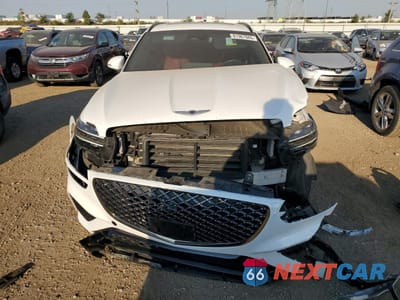 Piąte zdjęcie samochodu w środku: 2022 GENESIS GV70 BASE VIN:KMUMCDTC6NU041686 - miniatura