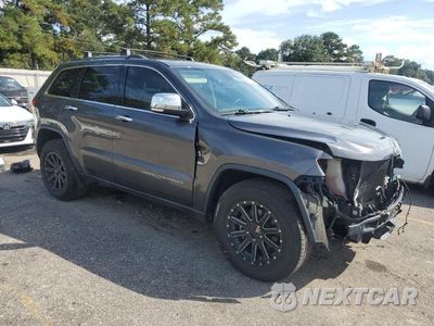 Czwarte zdjęcie samochodu z boku: 2014 JEEP GRAND CHEROKEE LIMITED VIN:1C4RJFBG3EC377686 - miniatura