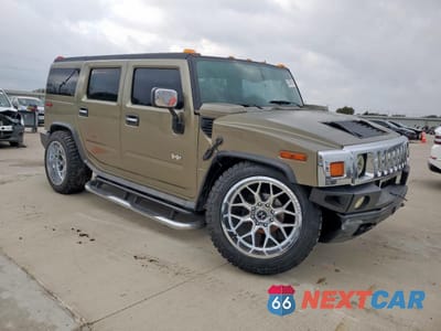 Czwarte zdjęcie samochodu z boku: 2005 HUMMER H2 VIN:5GRGN23U95H126939 - miniatura