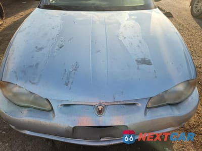 Zdjęcie 11 z 14 samochodu: 2001 CHEVROLET MONTE CARLO LS VIN:2G1WW15E119215521 - miniatura