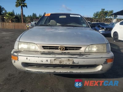 Piąte zdjęcie samochodu w środku: 1997 TOYOTA COROLLA BASE VIN:1NXBA02E5VZ658455 - miniatura