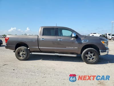 Czwarte zdjęcie samochodu z boku: 2016 NISSAN TITAN XD SL VIN:1N6BA1F47GN514606 - miniatura