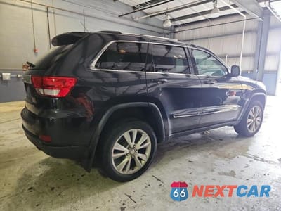 Trzecie zdjęcie samochodu z tyłu: 2013 JEEP GRAND CHEROKEE LAREDO VIN:1C4RJFAG4DC556254 - miniatura