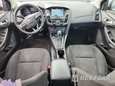 Zdjęcie 8 z 13 samochodu: 2017 FORD FOCUS SEL VIN:1FADP3H21HL326474 - miniatura