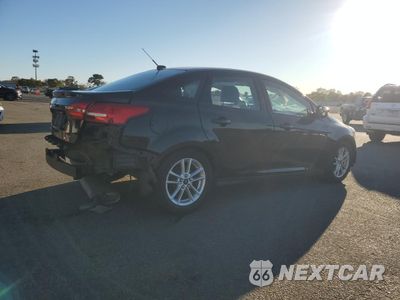 Trzecie zdjęcie samochodu z tyłu: 2016 FORD FOCUS SE VIN:1FADP3F28GL240371 - miniatura