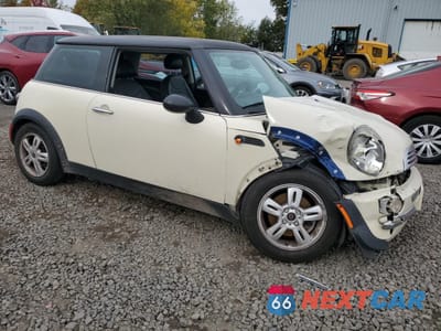 Czwarte zdjęcie samochodu z boku: 2003 MINI COOPER VIN:WMWRC33493TE15349 - miniatura