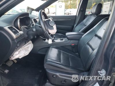 Zdjęcie 7 z 14 samochodu: 2014 JEEP GRAND CHEROKEE SUMMIT VIN:1C4RJFJG6EC338723 - miniatura