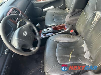 Zdjęcie 14 z 15 samochodu: 2005 HYUNDAI SONATA GLS VIN:KMHWF35H95A106663 - miniatura