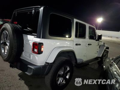 Trzecie zdjęcie samochodu z tyłu: 2020 JEEP WRANGLER UNLIMITED SAHARA VIN:1C4HJXEN5LW259422 - miniatura