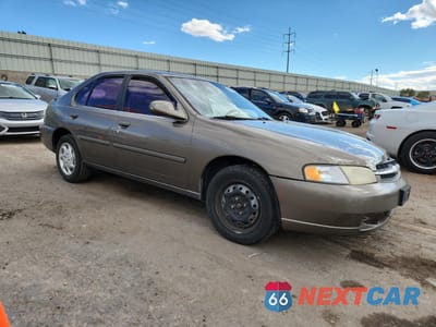 Czwarte zdjęcie samochodu z boku: 1999 NISSAN ALTIMA XE VIN:1N4DL01D9XC164422 - miniatura