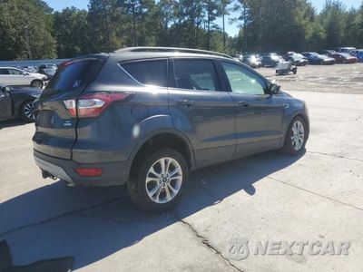 Trzecie zdjęcie samochodu z tyłu: 2017 FORD ESCAPE SE VIN:1FMCU0GD3HUA68769 - miniatura