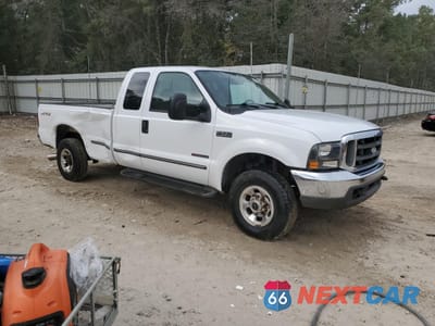 Czwarte zdjęcie samochodu z boku: 1999 FORD F250 SUPER DUTY VIN:1FTNX21F8XED36928 - miniatura