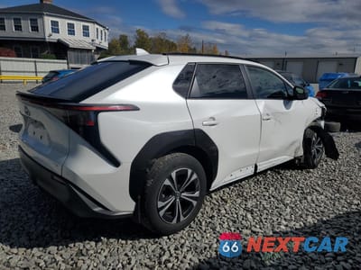 Trzecie zdjęcie samochodu z tyłu: 2023 TOYOTA BZ4X XLE VIN:JTMABACA3PA015184 - miniatura