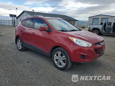 Czwarte zdjęcie samochodu z boku: 2010 HYUNDAI TUCSON GLS VIN:KM8JUCAC1AU112492 - miniatura