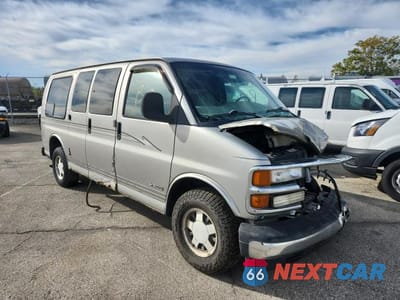 Czwarte zdjęcie samochodu z boku: 2000 CHEVROLET EXPRESS G1500 VIN:1GBFG15M4Y1200350 - miniatura