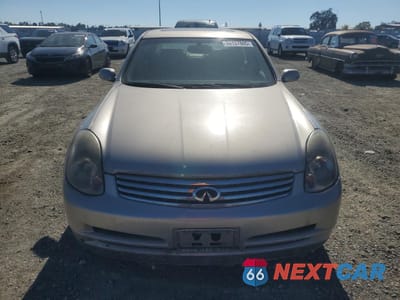 Piąte zdjęcie samochodu w środku: 2003 INFINITI G35 VIN:JNKCV51E43M015022 - miniatura