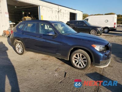 Czwarte zdjęcie samochodu z boku: 2015 BMW X1 XDRIVE28I VIN:WBAVL1C51FVY35107 - miniatura