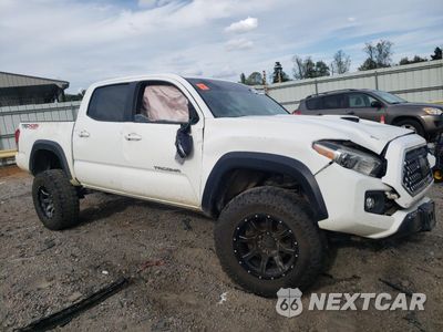 Czwarte zdjęcie samochodu z boku: 2018 TOYOTA TACOMA DOUBLE CAB VIN:5TFCZ5ANXJX126031 - miniatura
