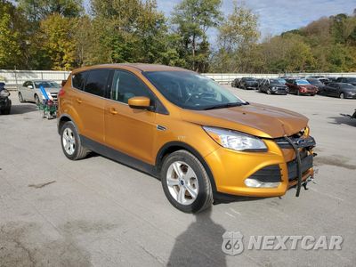 Czwarte zdjęcie samochodu z boku: 2016 FORD ESCAPE SE VIN:1FMCU9GX9GUA73715 - miniatura