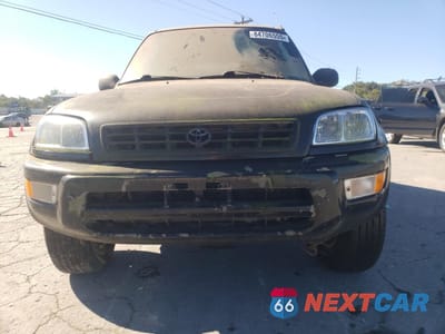 Piąte zdjęcie samochodu w środku: 1999 TOYOTA RAV4 VIN:JT3GP10V2X7054952 - miniatura