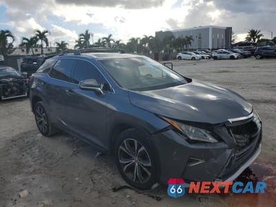 Czwarte zdjęcie samochodu z boku: 2016 LEXUS RX 350 BASE VIN:2T2BZMCAXGC030841 - miniatura