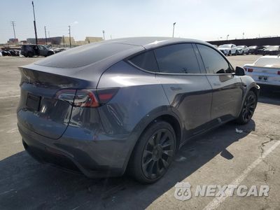 Trzecie zdjęcie samochodu z tyłu: 2023 TESLA MODEL Y VIN:7SAYGDED8PF971831 - miniatura